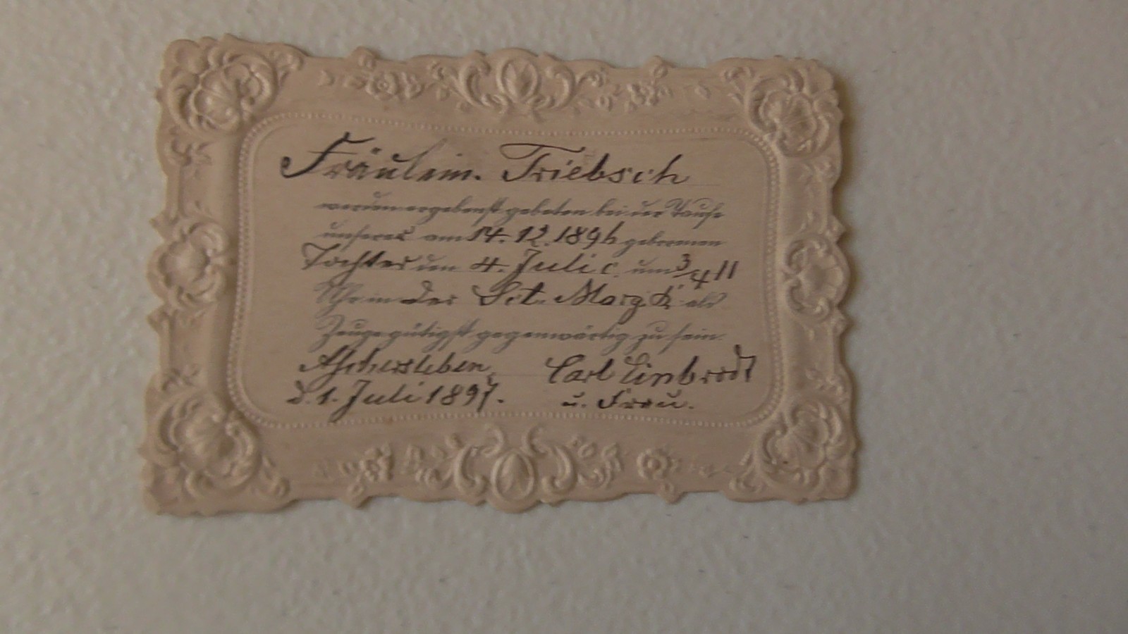 Vintage 1896 Embossed Card, handwritten German text in an older script Vintage 1896 Embossed Card, handwritten German text in an older script