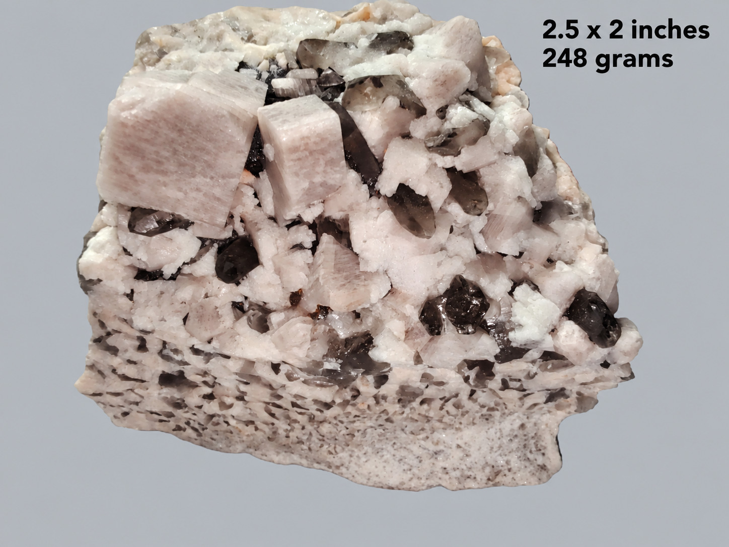 Microcline (Manebach Twin), Albite, and Smoky Quartz, Sleeping Princess, CO.