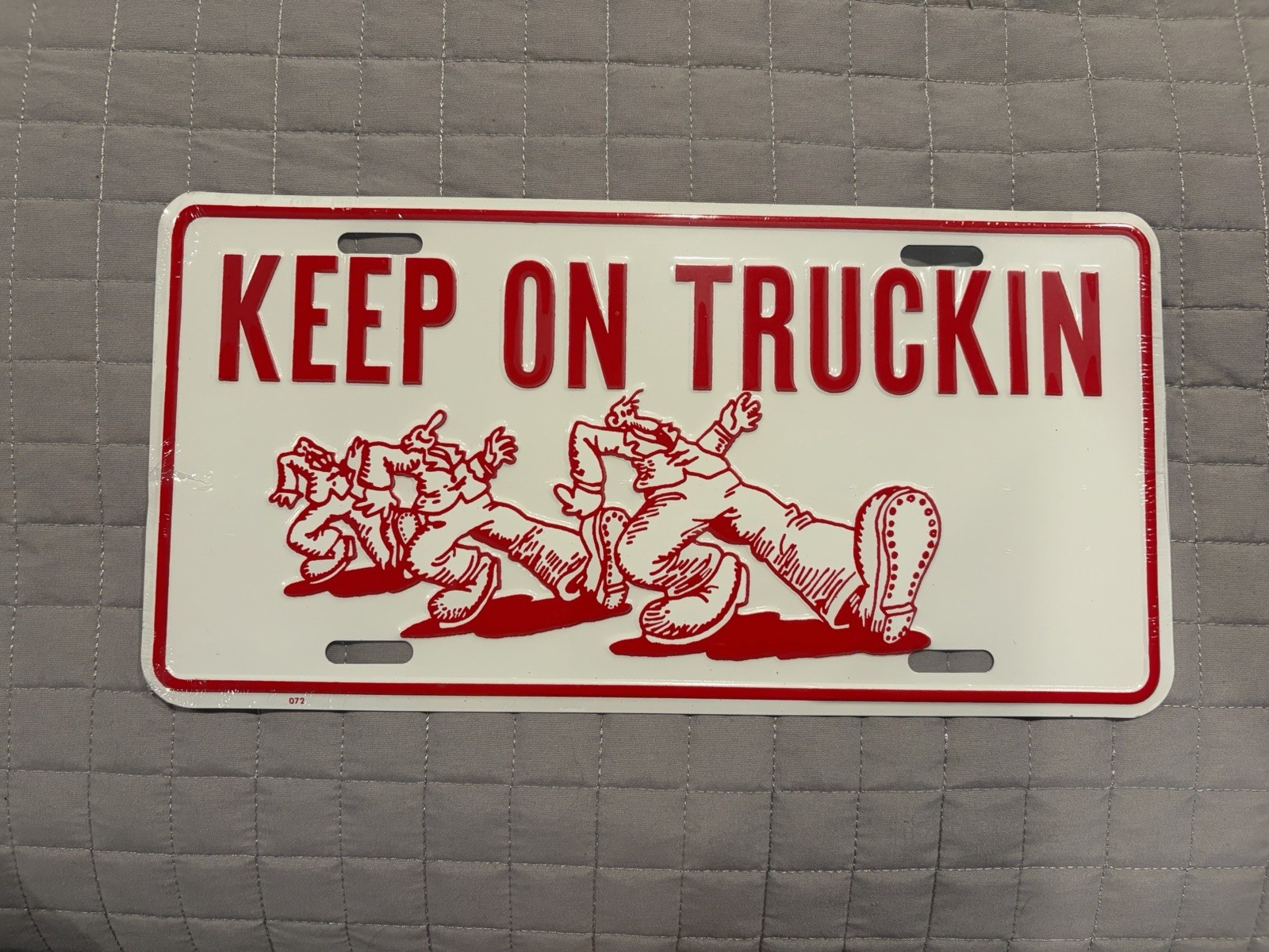 Vintage “KEEP ON TRUCKIN” License Plate Embossed Metal, NOS