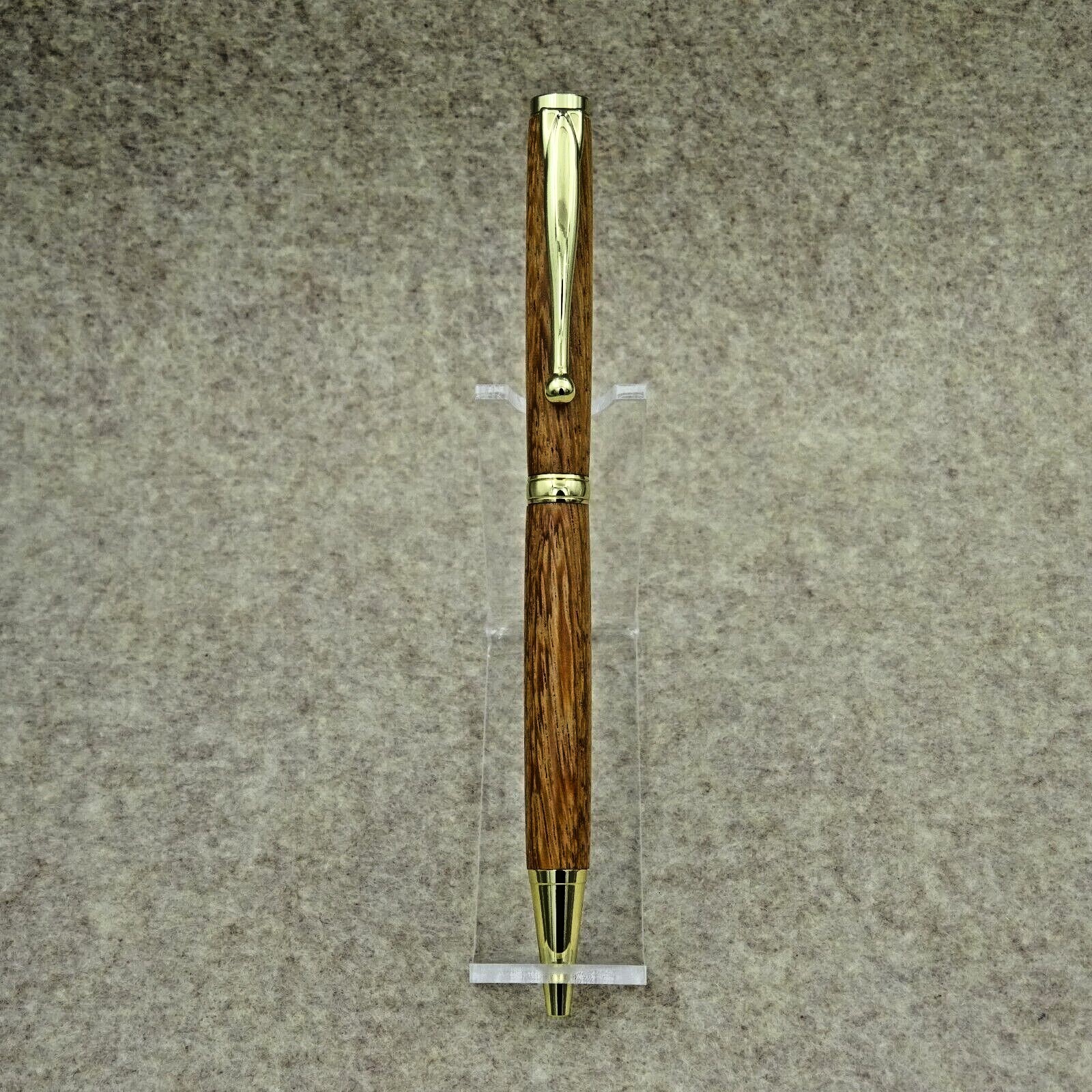 SLIMLINE TWIST PEN with ANGELIM PEDRA BARREL and GOLD TRIM SLIMLINE TWIST PEN with ANGELIM PEDRA BARREL and GOLD TRIM