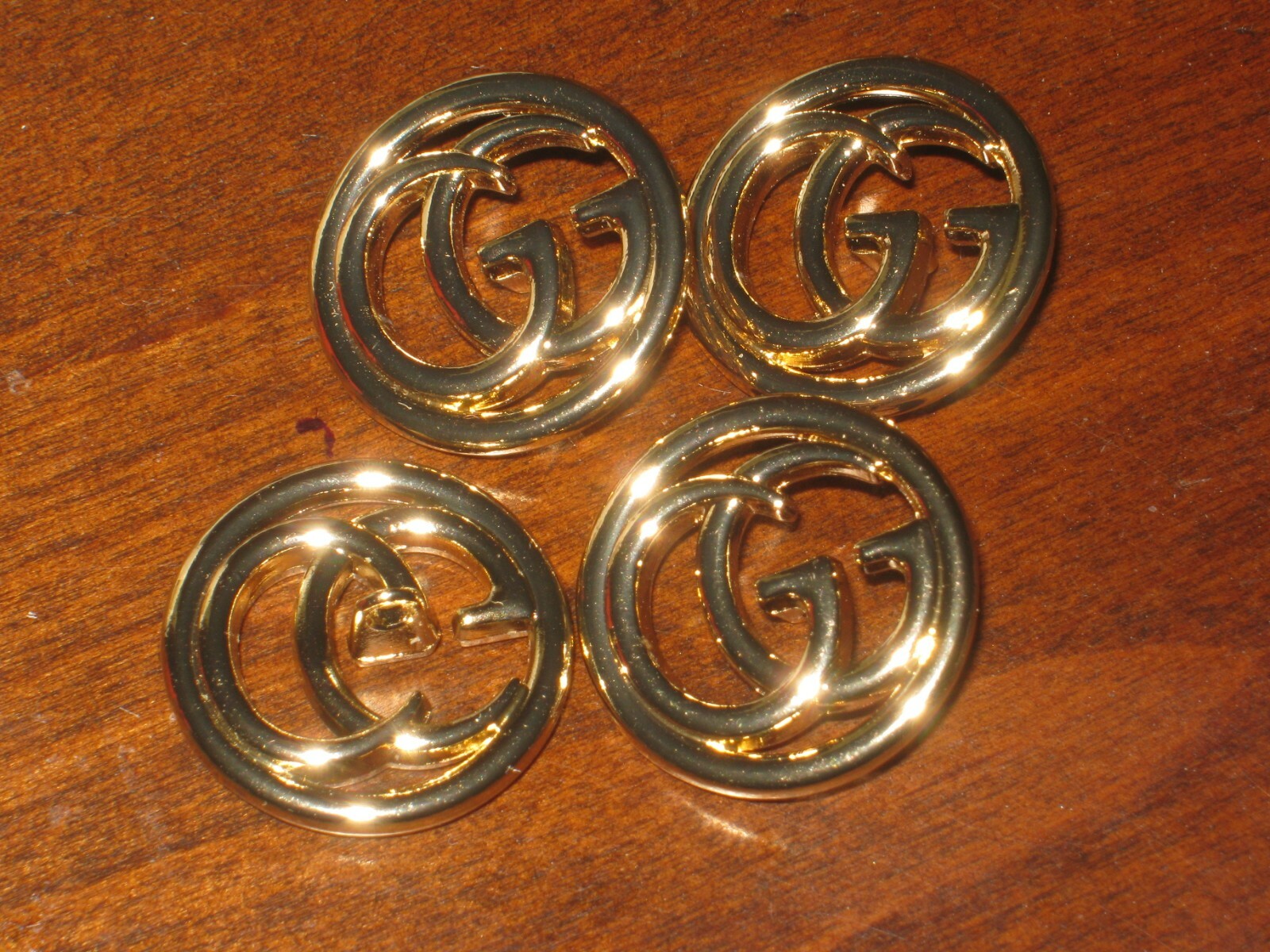 Gucci 4 buttons GOLD tone   18mm  BUTTONS THIS IS FOR A LOT OF FOUR