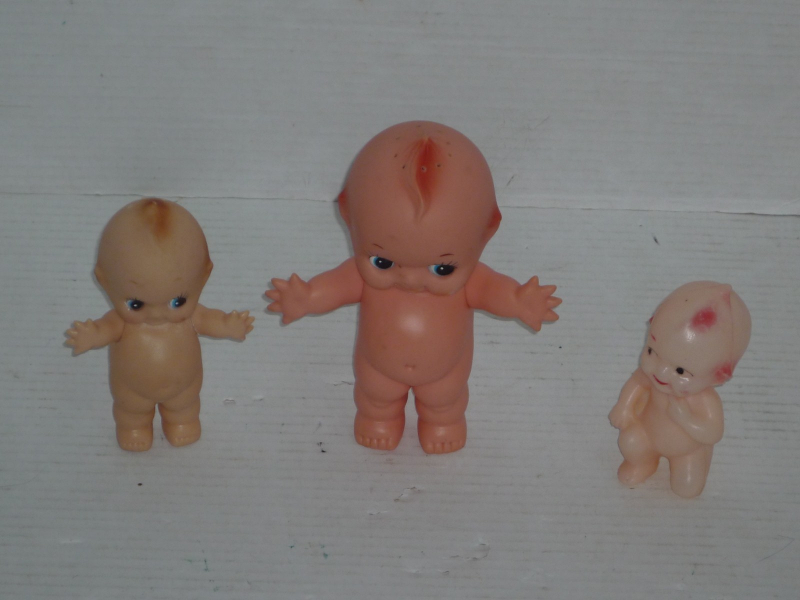 VINTAGE LOT OF (2) KEWPIE DOLL POWDER SHAKERS PLUS CELLULOID KEWPIE LOT
