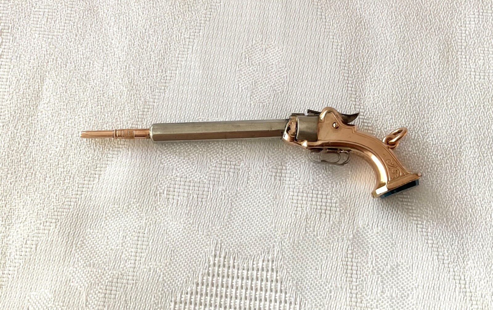 antique English silver and 9k gold miniature pistol pencil holder