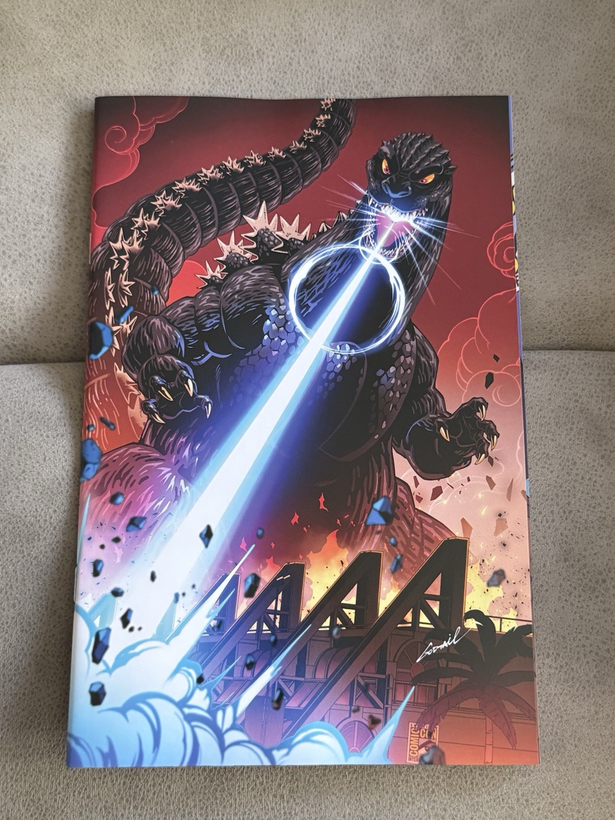 SDCC 2026 IDW Godzilla vs America: San Diego Variant Cover by Godtail Comic Con SDCC 2026 IDW Godzilla vs America: San Diego Variant Cover by Godtail Comic Con
