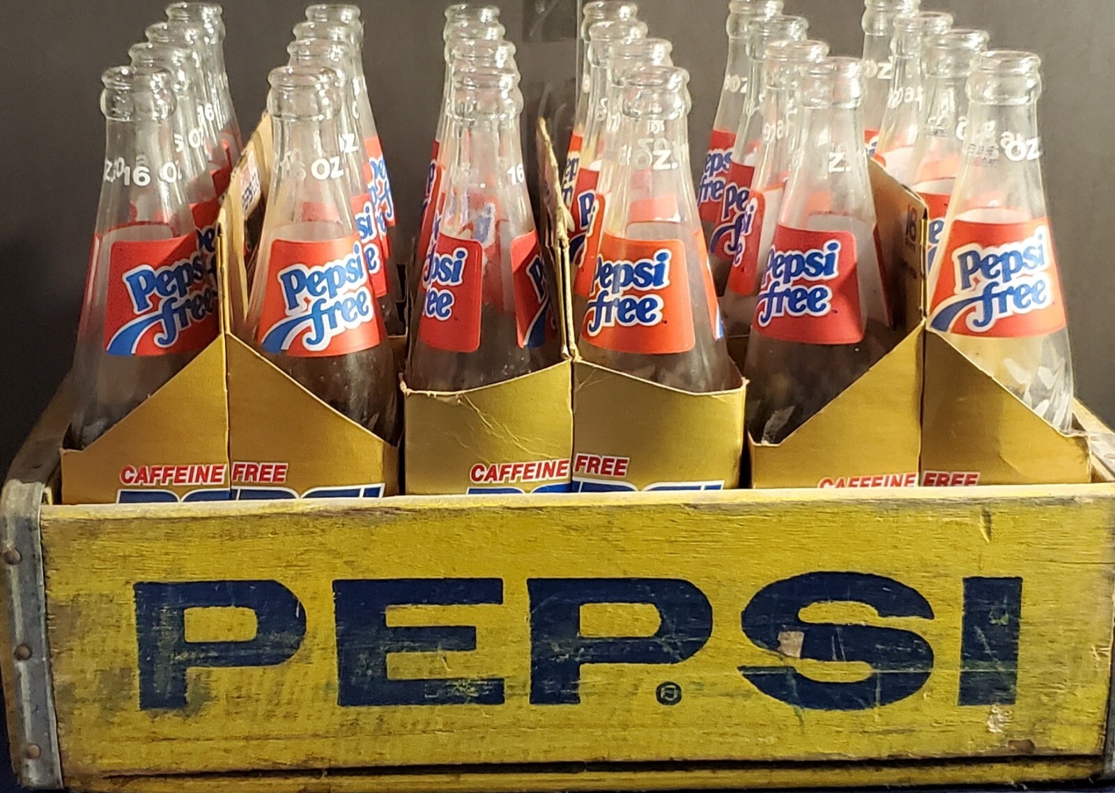 Vintage 1975 Pepsi crate filled with Pepsi free 16oz clear glass bottles with...