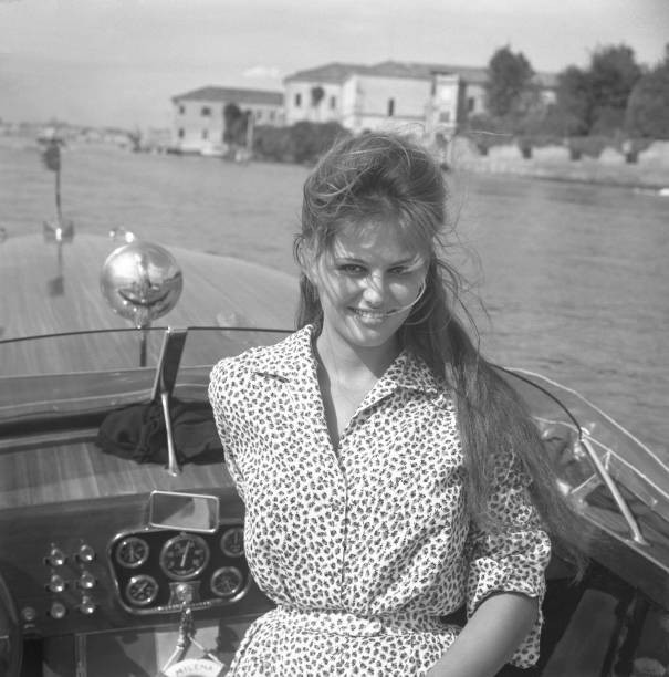 Italian actress Claudia Cardinale wearing a floral dress potrayed - Old Photo