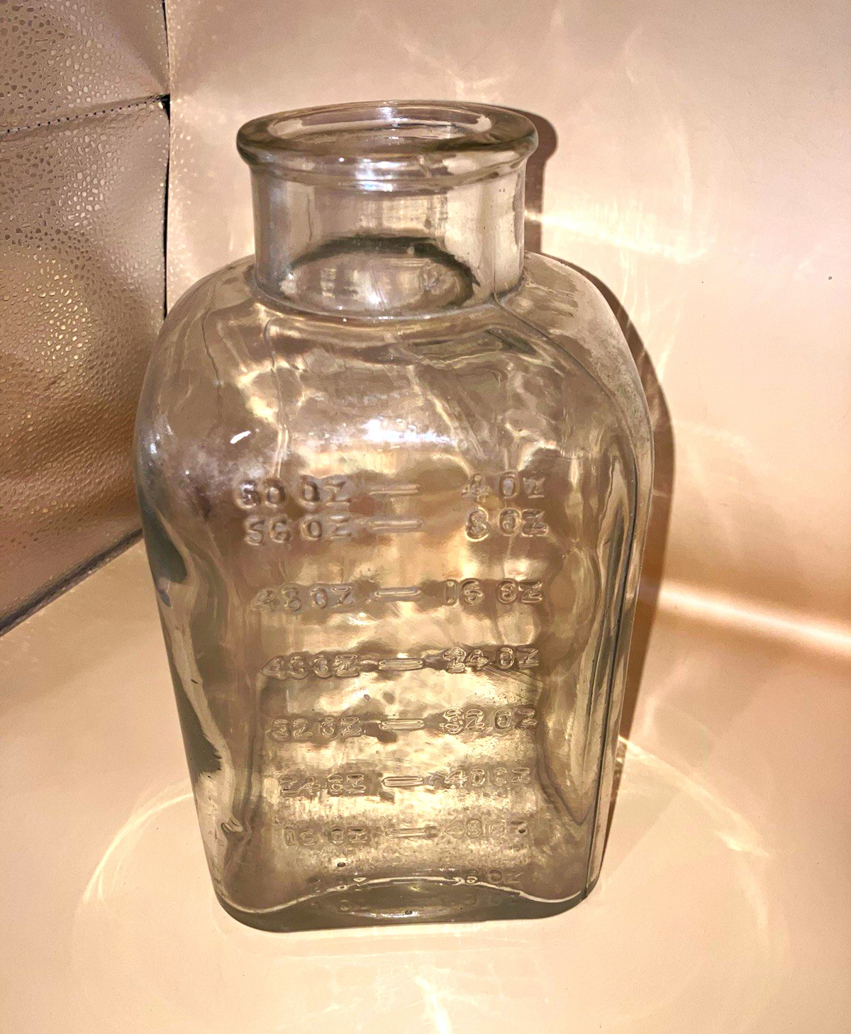 Clear Glass Medicine Bottle Square Shape Embossed Ounce Measurements 60 oz