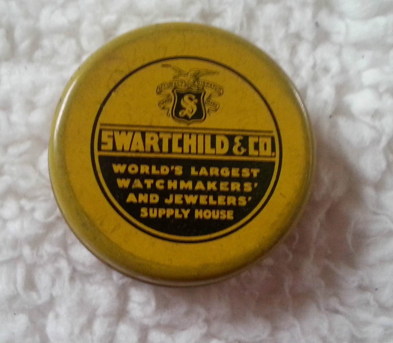 Old Ad Tin Swartchild & Co World\'s Largest Watchmaker Jewelers\' Supply House