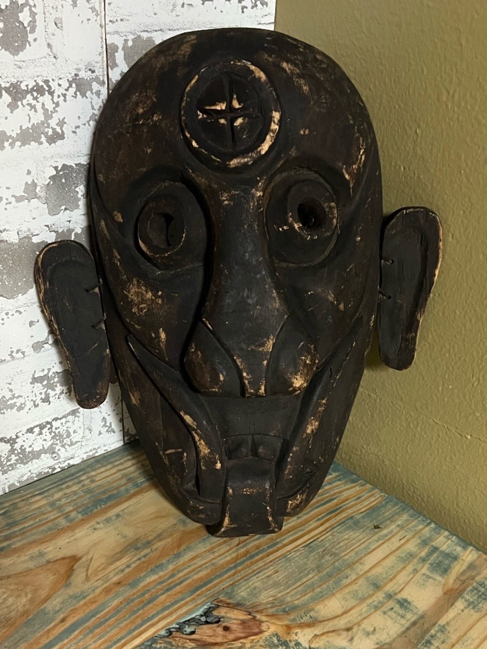 Vintage hand-carved wooden tribal mask