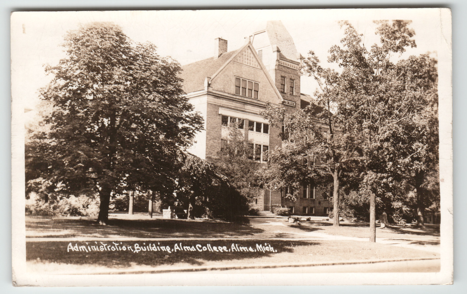 Postcard RPPC Administration Building of Alma College in Alma, MI.