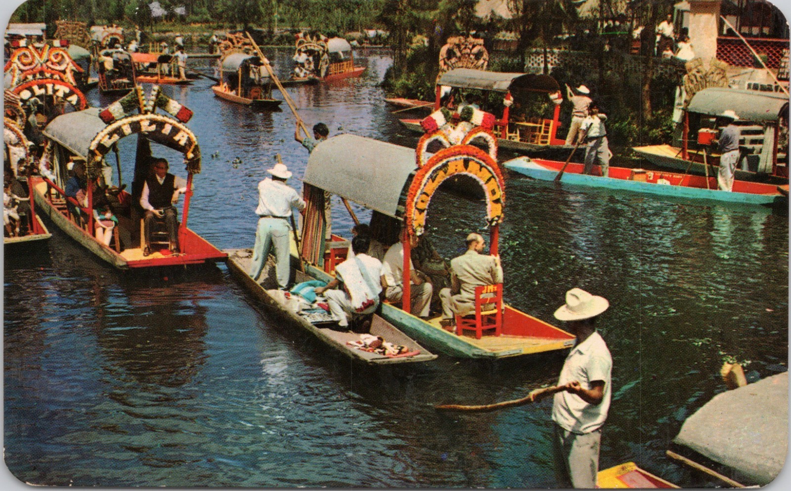 POSTCARD- FLOWER -DECKED BOATS CARRY EXCURSIONISTS, XOCHIMILCO, MEXICO