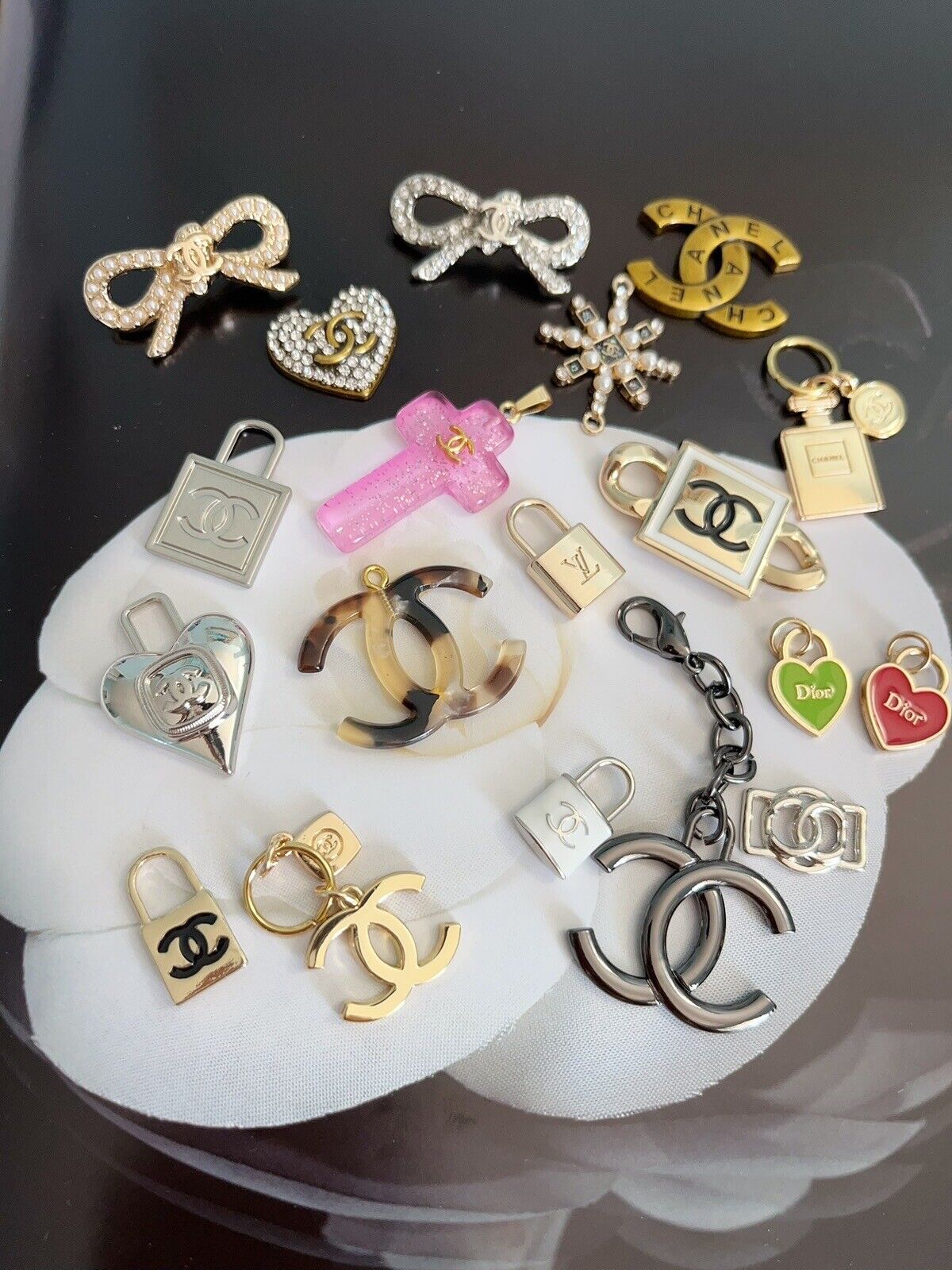 Lot of 19 Chanel buttons and zipper Pulls