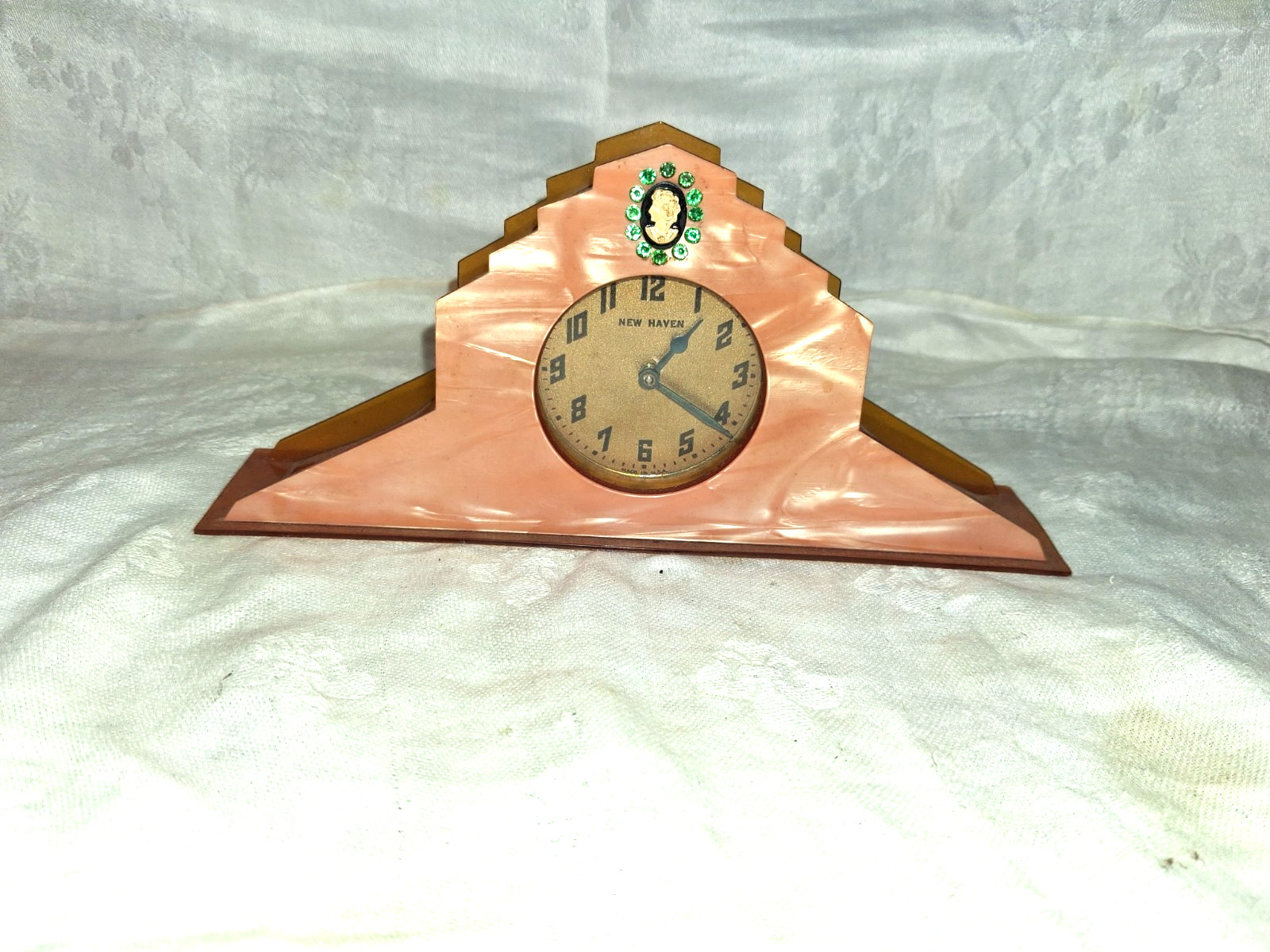 1930's Art Deco Celluloid W/Green Rhinestones Vanity Clock Windup, not working. 1930's Art Deco Celluloid W/Green Rhinestones Vanity Clock Windup, not working.