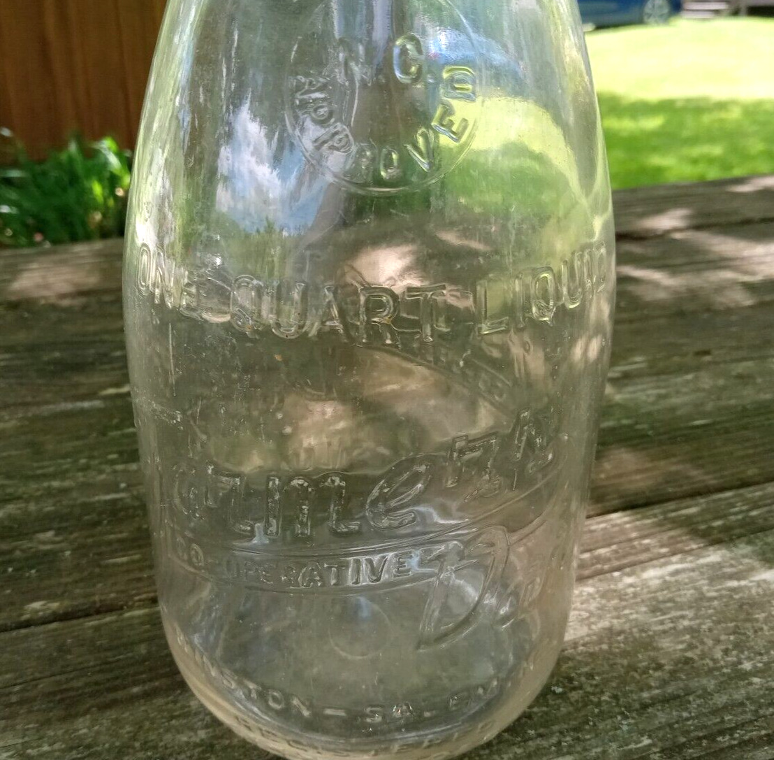 FARMER'S CO-OPERATIVE DAIRY Winston Salem, NC Embossed Glass Quart Milk Bottle