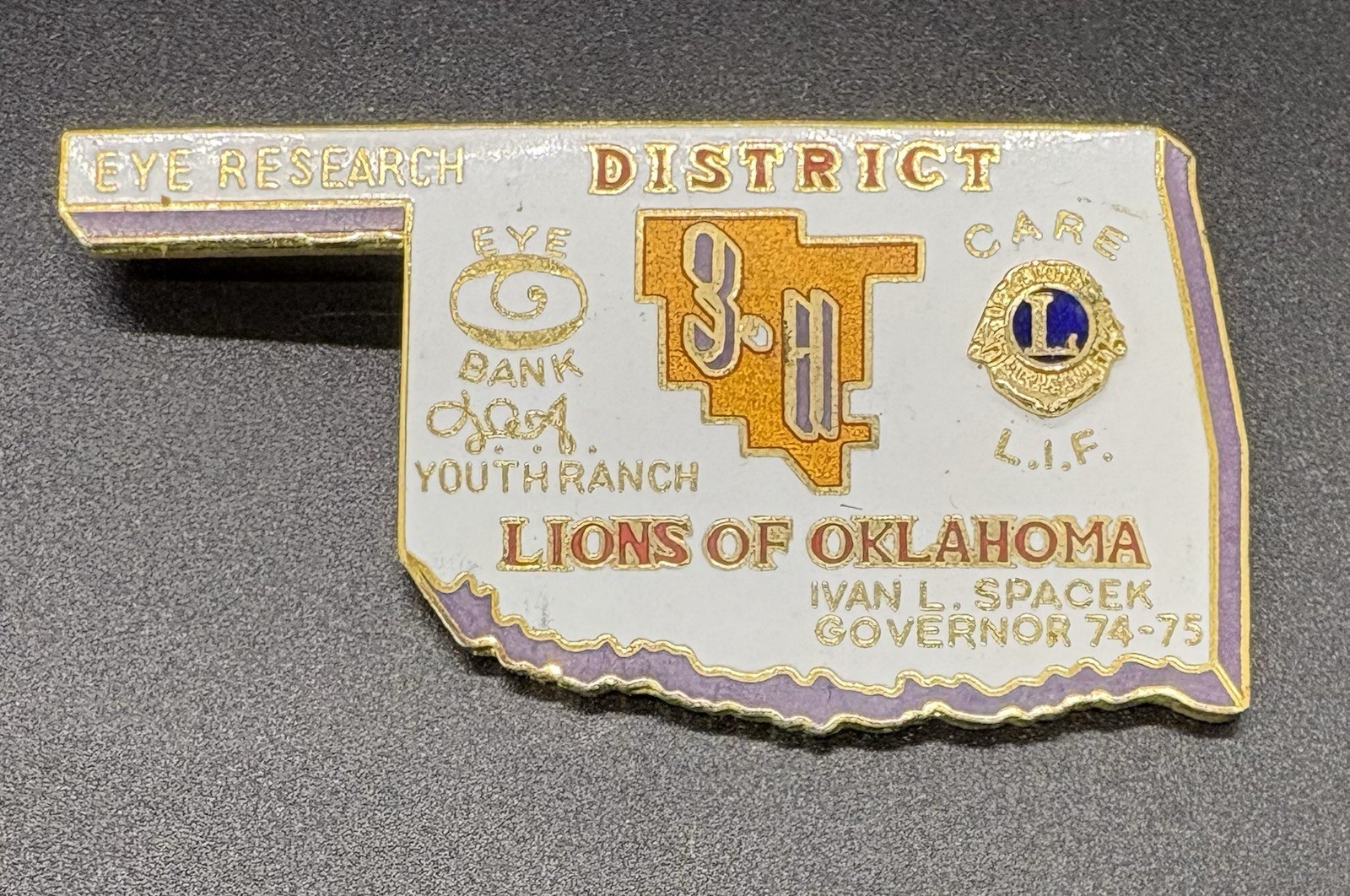 Vintage 1974-75 Lions of Oklahoma District 3-A Governor Ivan L. Spacek State Pin