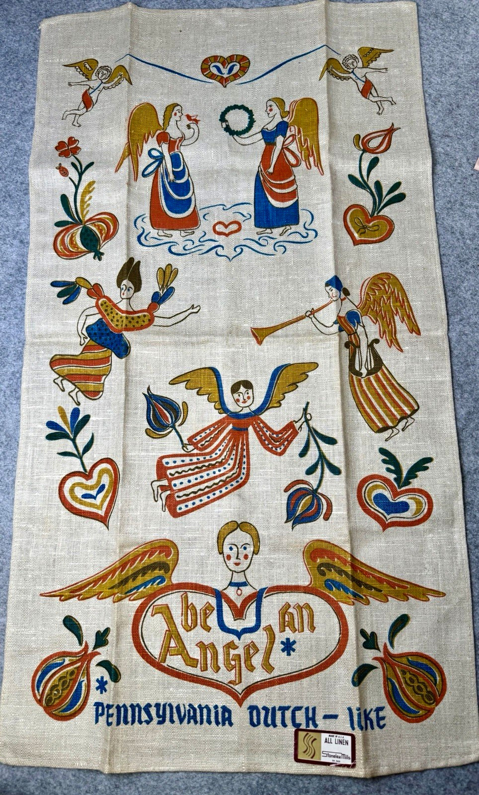 Vintage 1969 Pennsylvania Dutch folk art linen tea towel. Angel