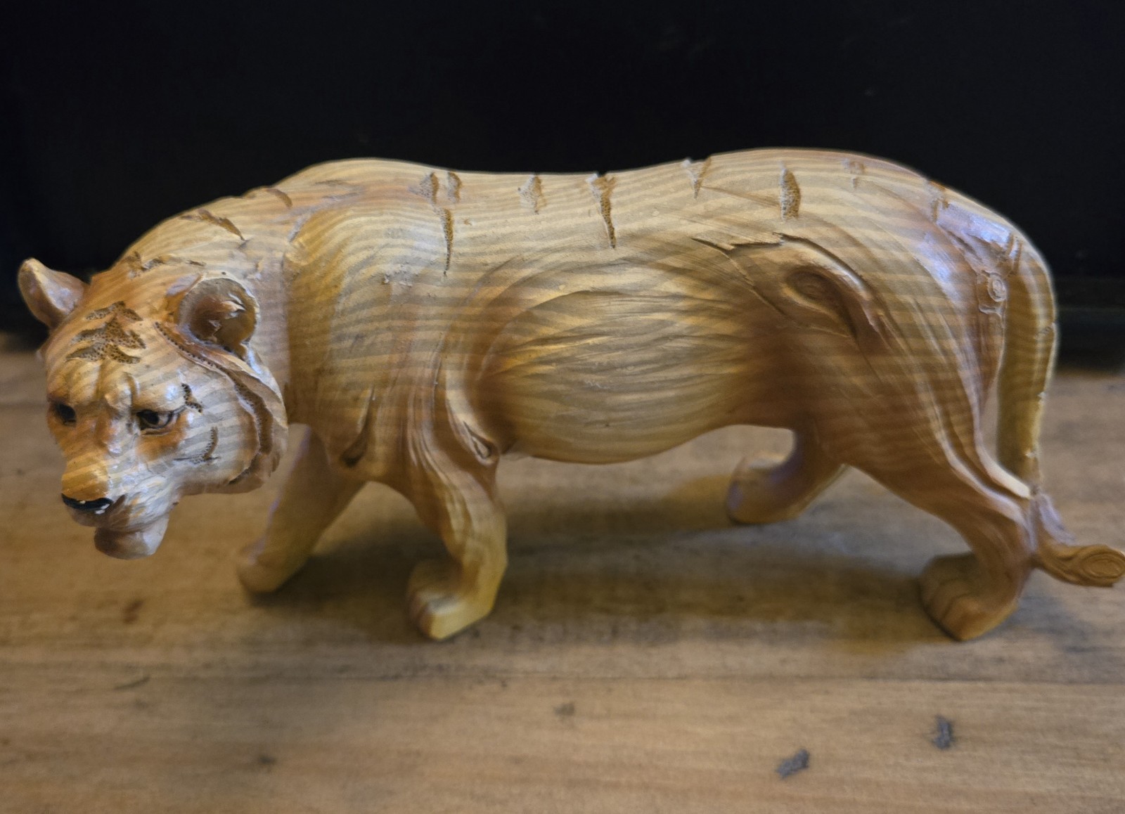 hand-carved wooden tiger figurine