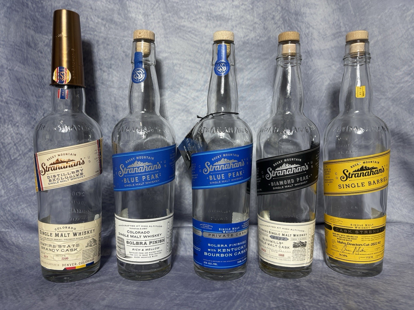 Stranahan\'s Exclusive Single Barrel Lot of 5 Decorative Decanter Bottles
