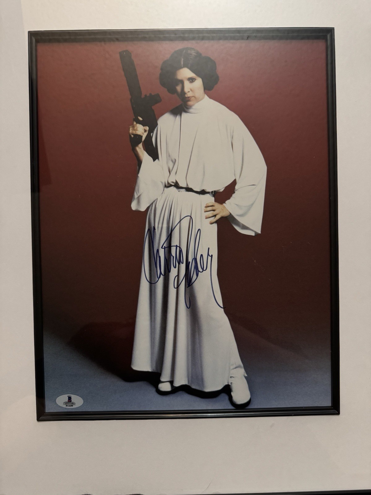 Carrie Fisher Autographed 11 x 14 STAR WARS Princess Leia Beckett Authenticated