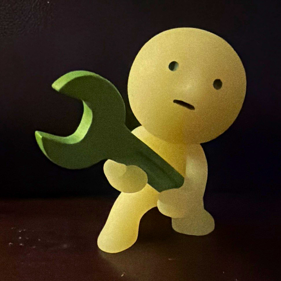 SMISKI Glow-in-the-Dark Figurine Holding Green Wrench Tool, 2in, 2028