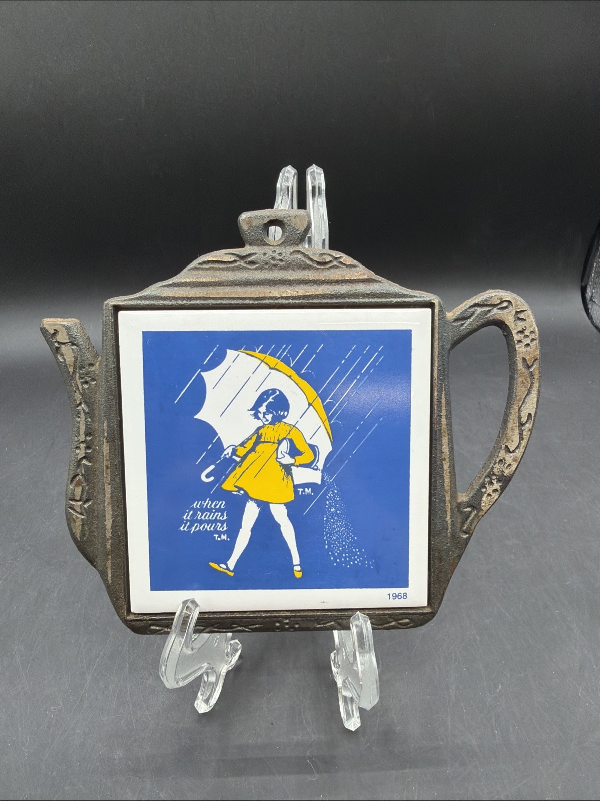 VTG Morton Salt Trivet Cast Iron Pot Umbrella Girl When it Rains it Pours Japan