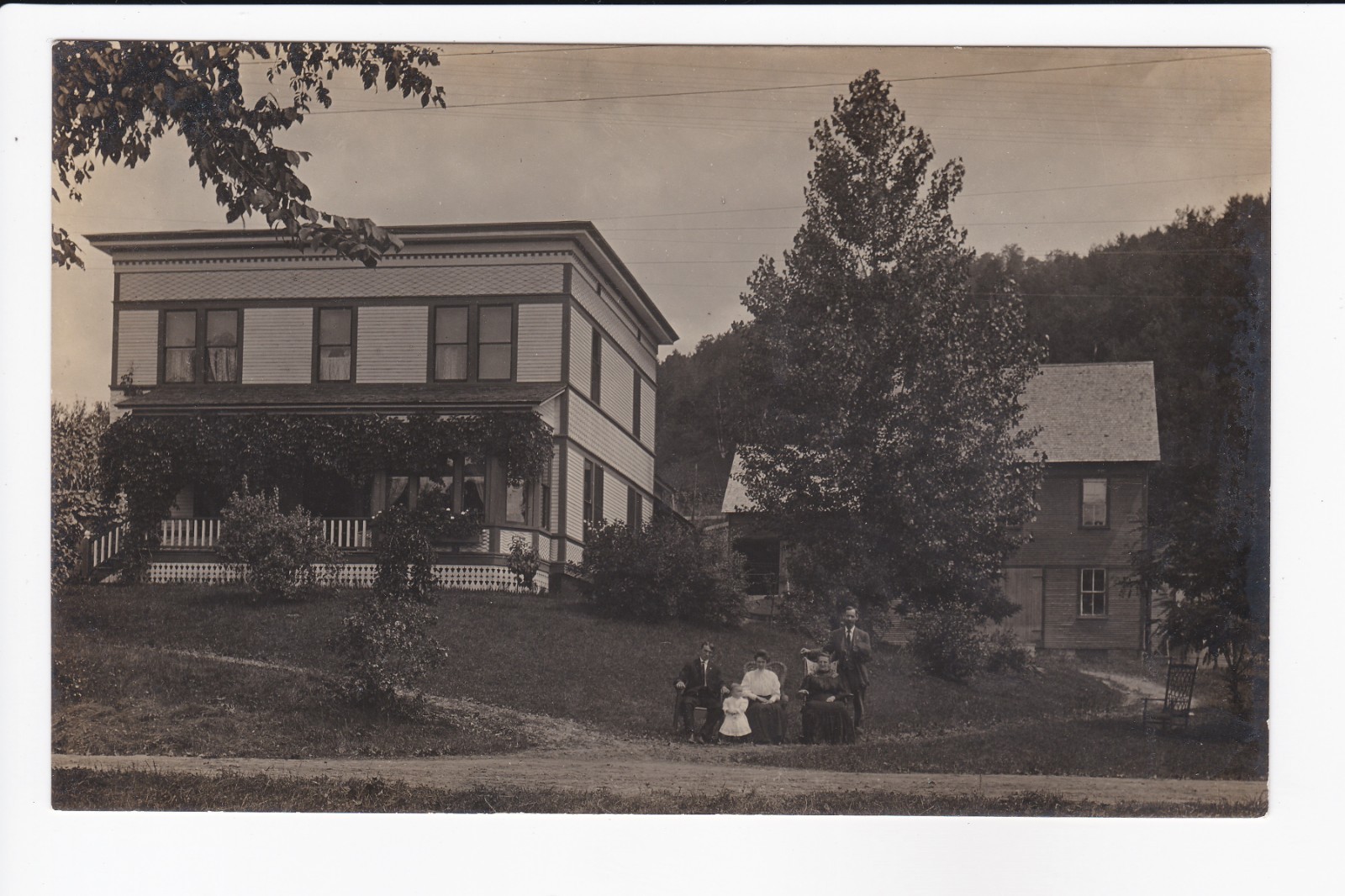 Family Posing For Photo In Front Of Their House c1904-1918 RPPC