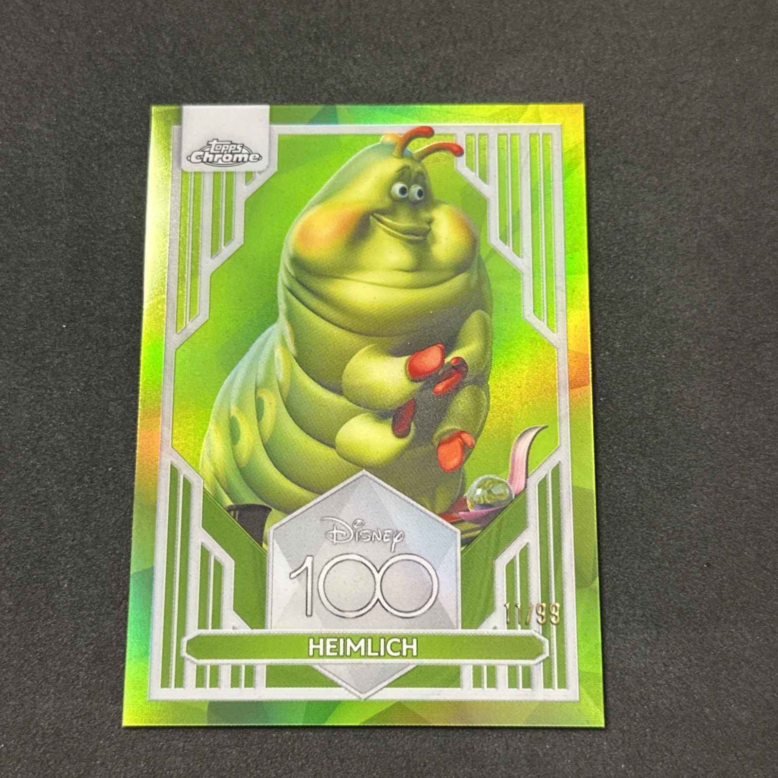 2023 Topps Chrome Disney 100 Heimlich Green Refractor #/99