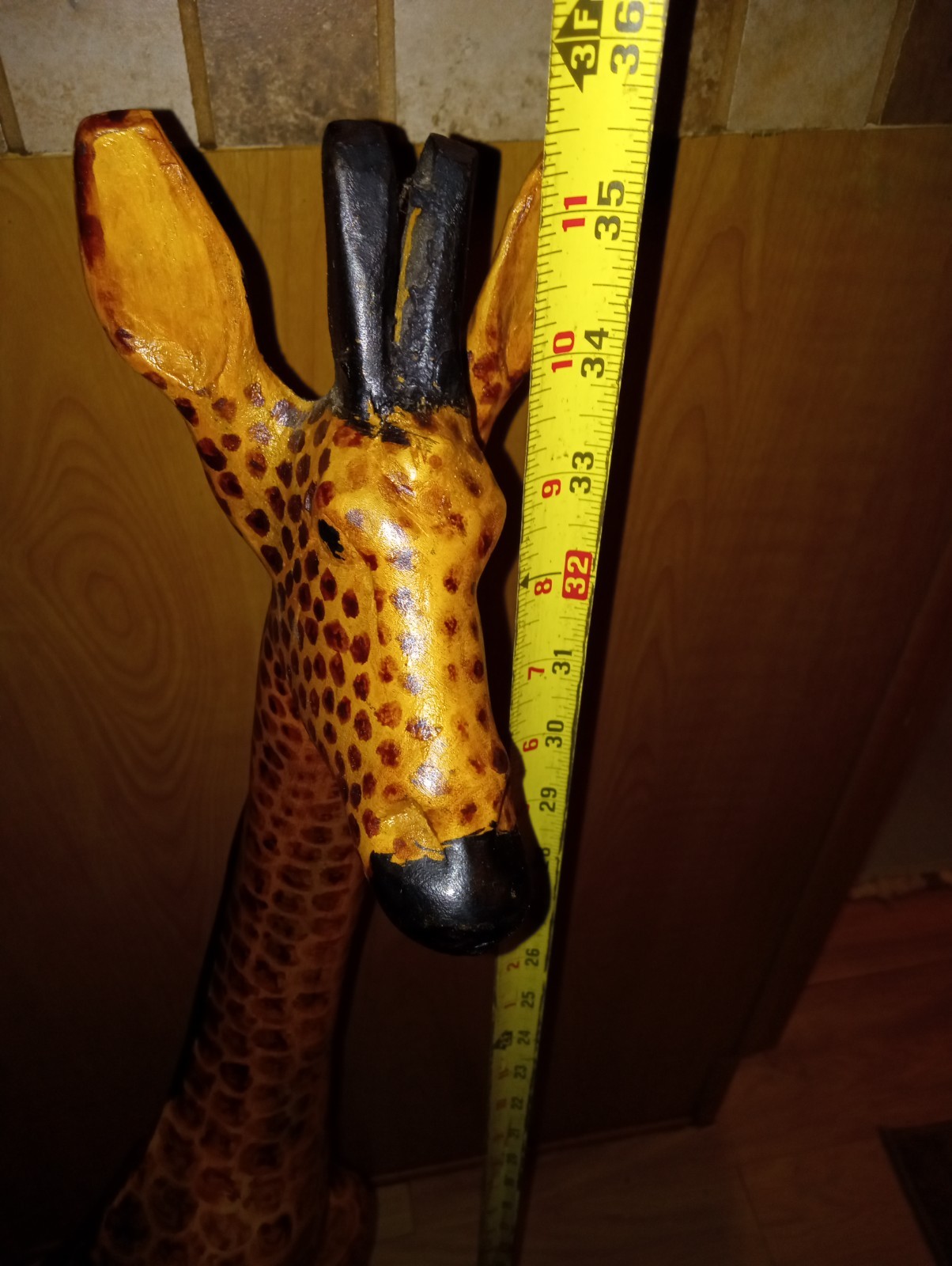 Hand carved wood giraffe. 3 ft tall.