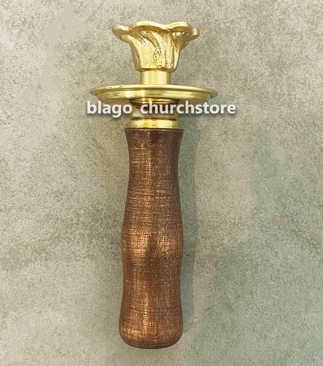 Church candlestick one candlestick in the hand