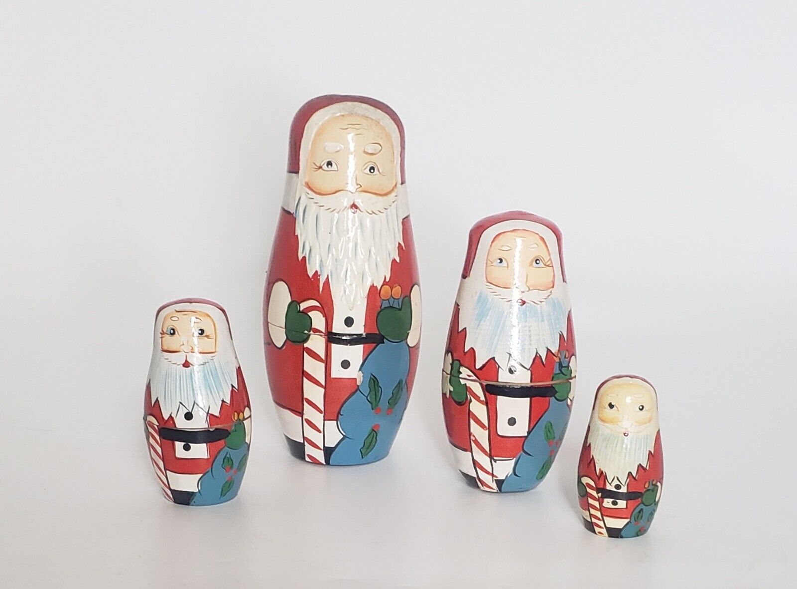 Vintage Wooden Santa Claus Nesting Dolls Set Of 4 Gift Bag Candy Cane 