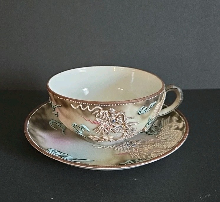 Japanese Dragonware Moriage Hand Painted Bisque Porcelain Cup w/ Saucer Japanese Dragonware Moriage Hand Painted Bisque Porcelain Cup w/ Saucer