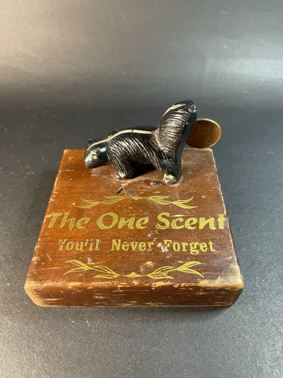 Vintage Novelty Wooden Skunk With 1970 Penny “ The One Scent You’ll Never Forget