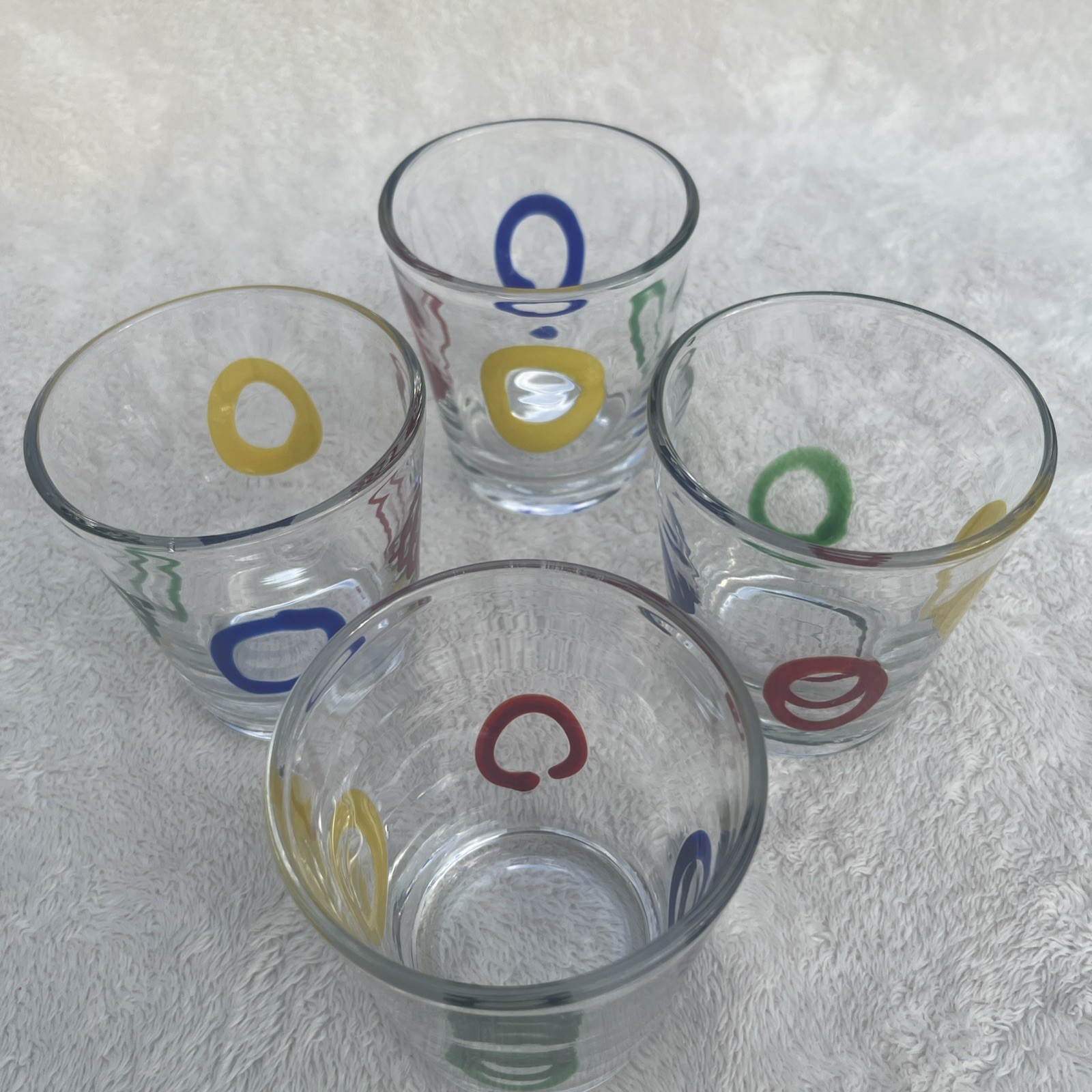 Set of 4 Hand-blown art glass lowball tumbler vibrant fused multicolor circles.