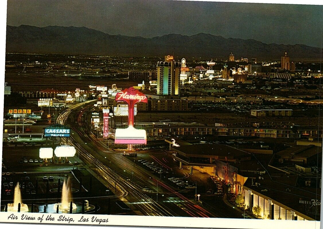 postcard Night lights strip Las Vegas. Caesars Palace Club Flamingo Sands 1902