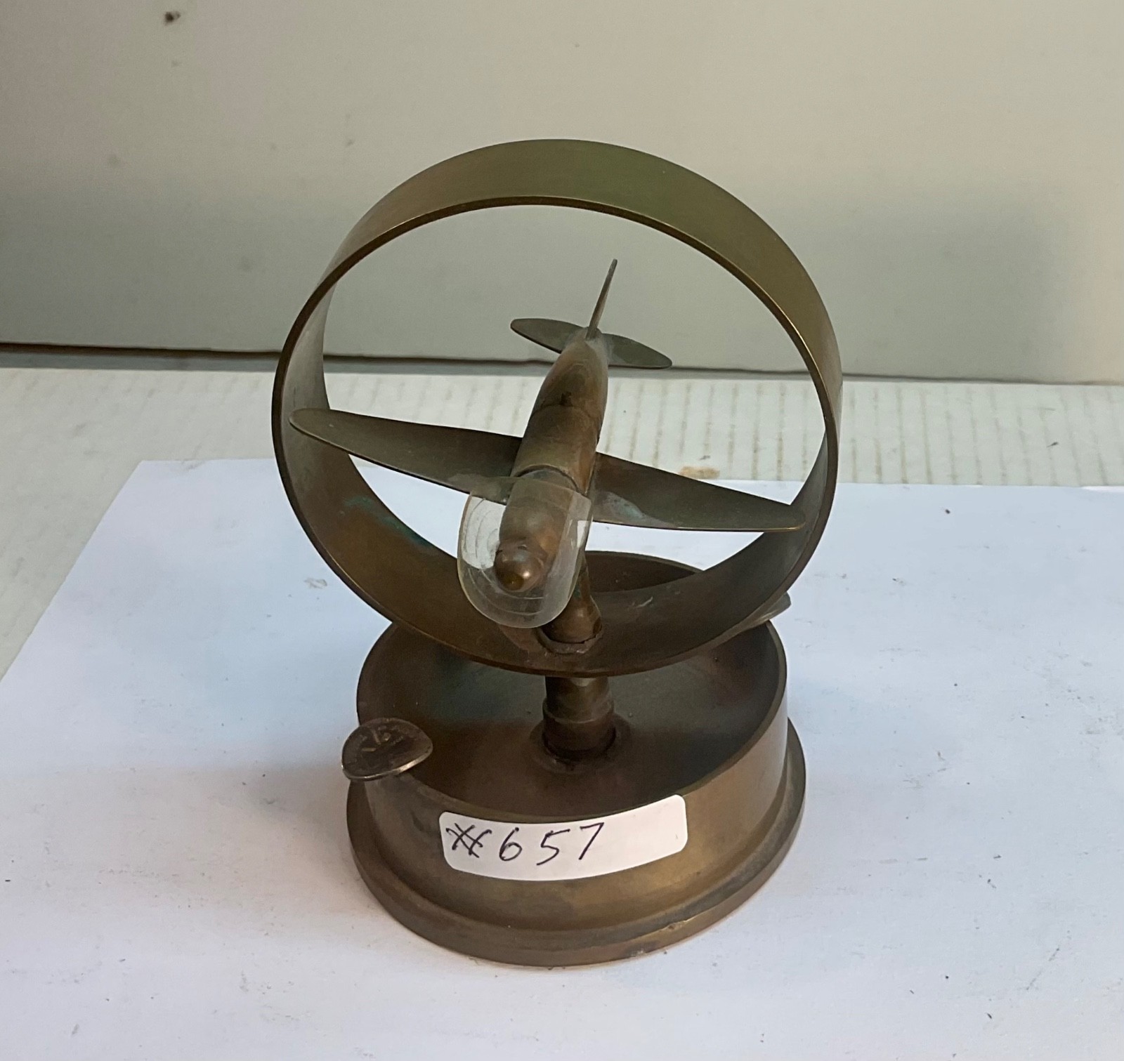 #657 US ARMY WW2 TRENCH ART ASHTRAY WITH AIRPLANE DATED 1943 WELL-MARKED