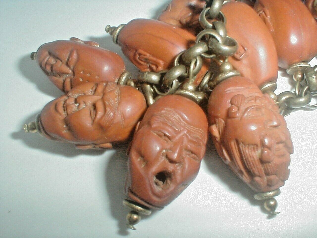 AUTHENTIC Asian MAN FACE Carved 18 BEAD PEACH PIT SCULPTURE GODS into necklace