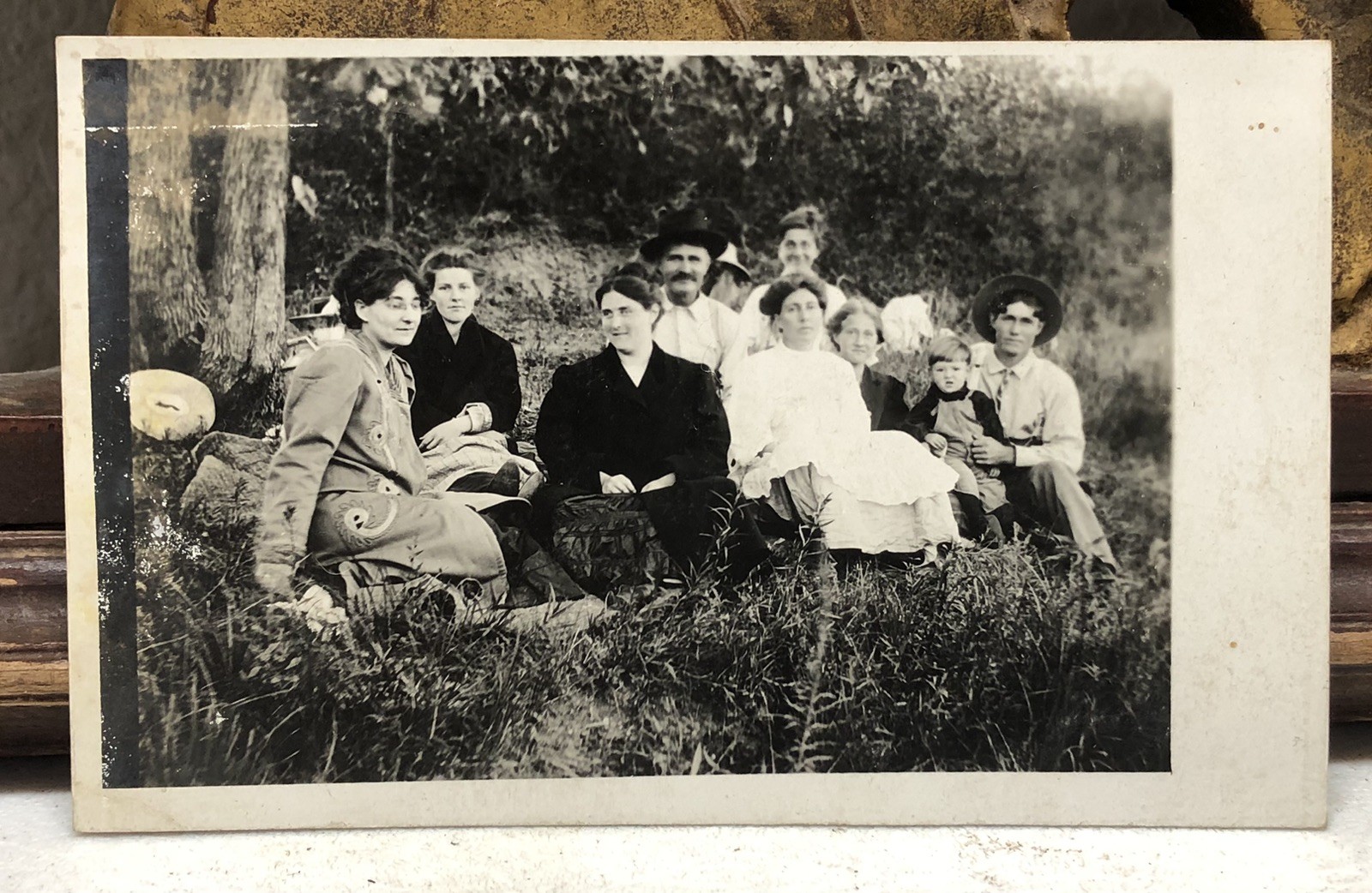 Family of 9 Posing Sitting Antique c1910s RPPC Photo Postcard - Damaged