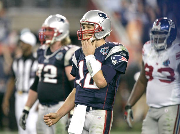 Patriots quarterback Tom Brady throws long for a hail mary pass du- Old Photo 2
