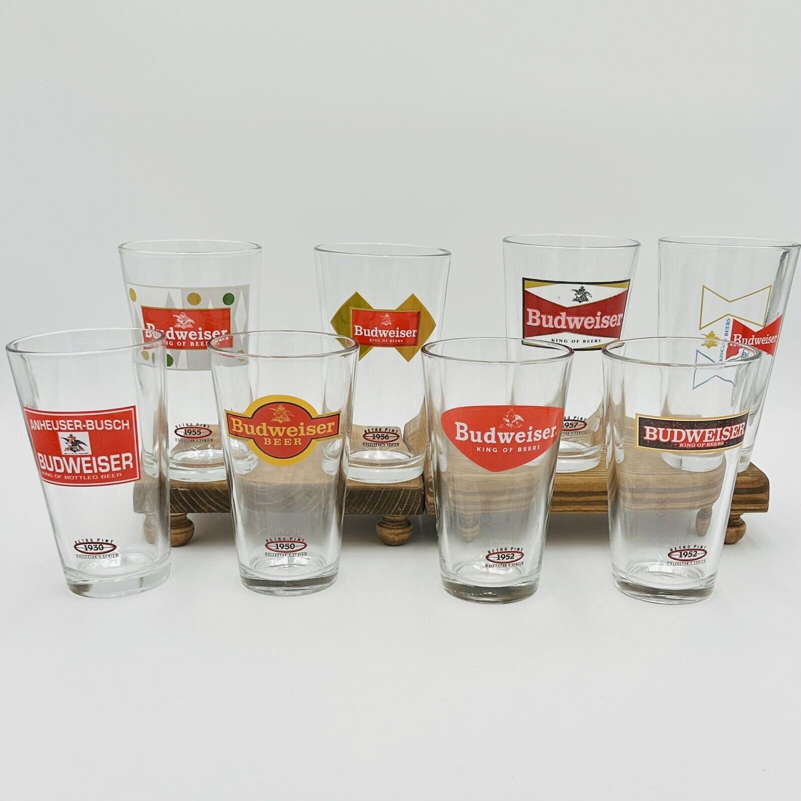 8 BUDWEISER 1930, 50, 52, 52, 55, 56, 57 & 59 Pint Collector Series Beer Glasses