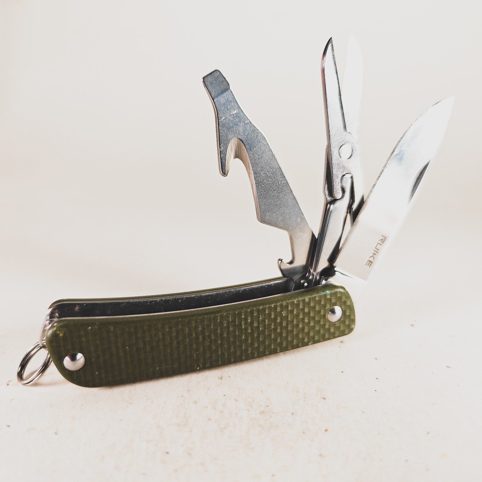 Ruike S31-G Multi Tool Pocket Knife Green G10 Sandvik 12C27 Scissors EDC