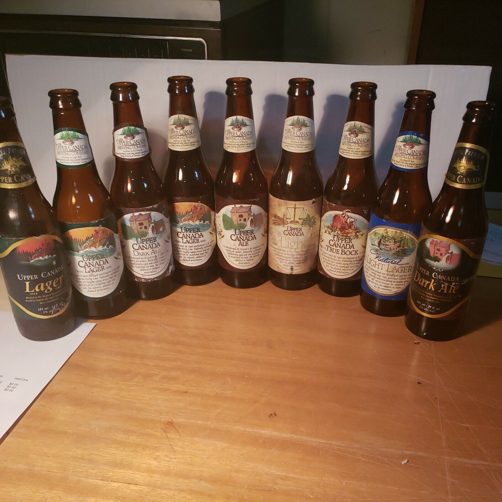 The Upper Canada Brewing Company (Bottle collection 9 bottles) empty as shown 