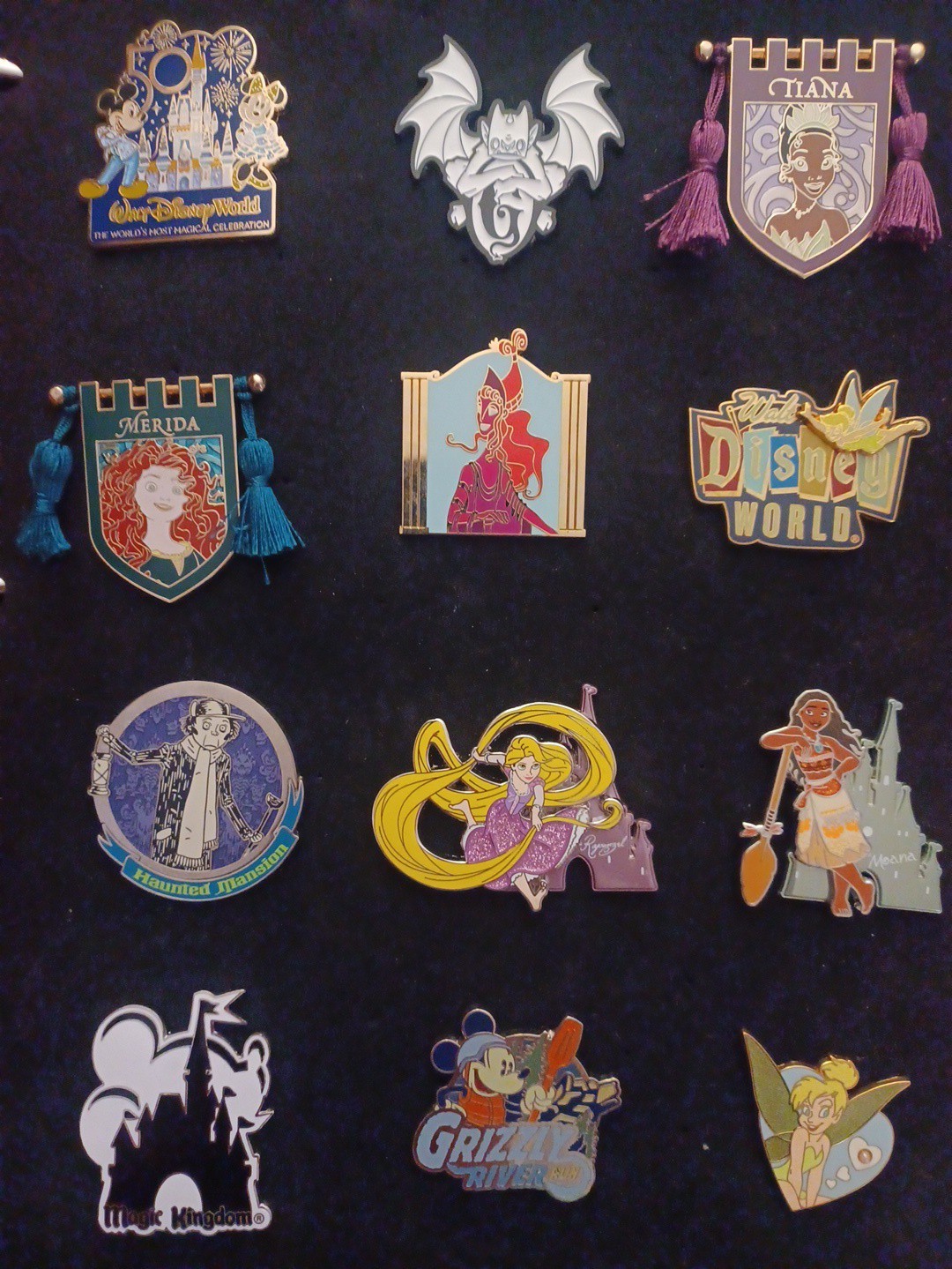 Disney Lot of 54 Pins With Disney Parks Pin Trading Binder.