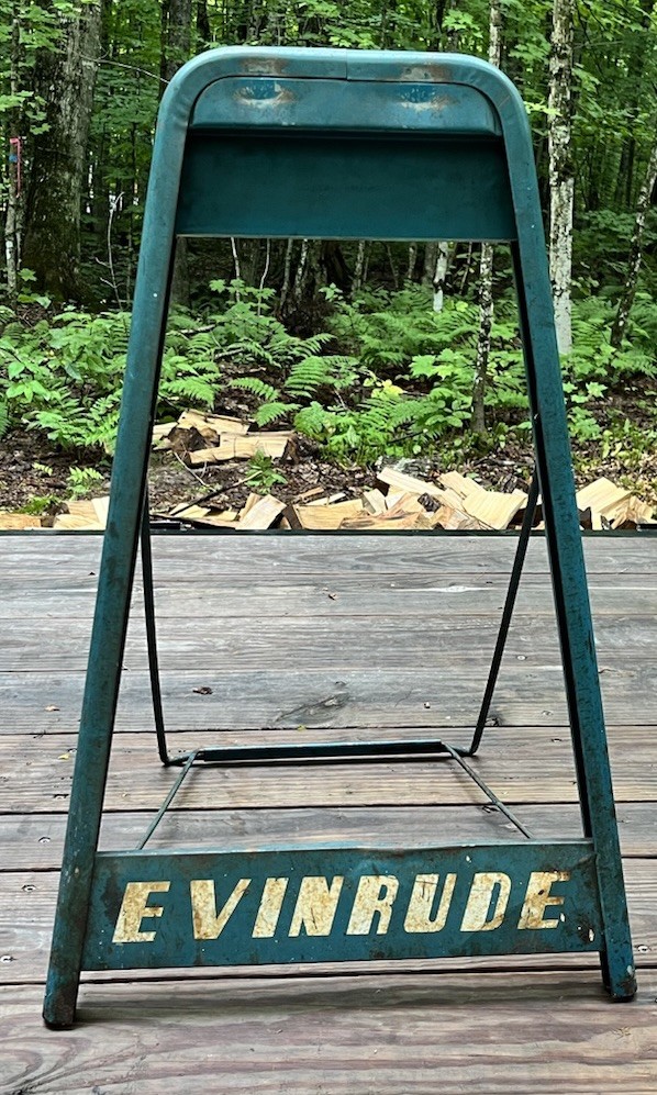 vintage Evinrude outboard boat motor stand