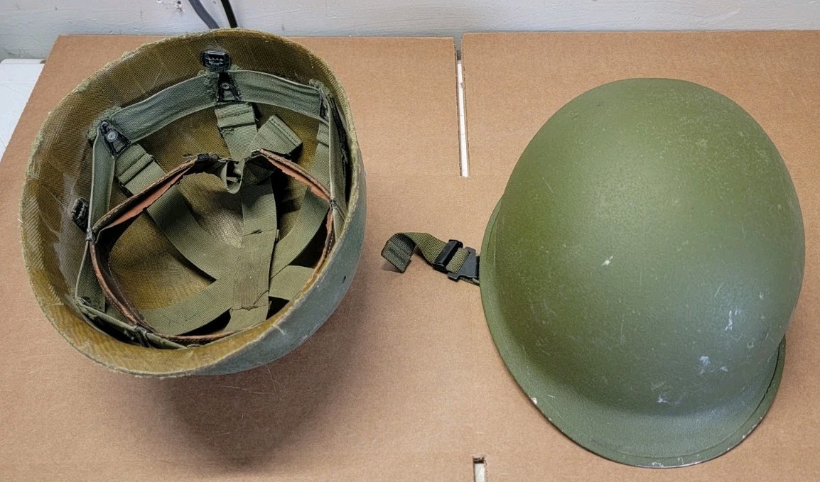 WWll M1 steel pot helmet rear seam swivel bale and liner Schlueter 522 Marked 