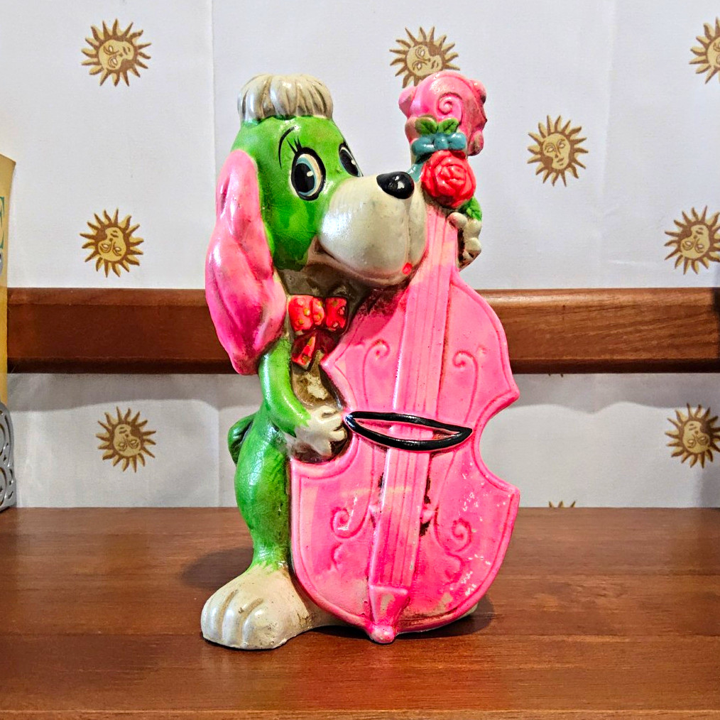 Vintage Chalkware Green Dog Pink Cello Coin Bank 1967 Vintage Chalkware Green Dog Pink Cello Coin Bank 1967