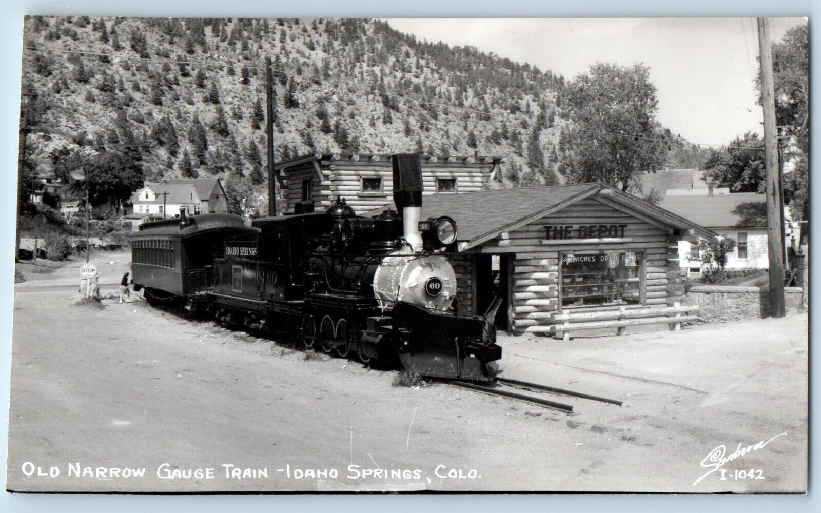 Idaho Spring CO Postcard RPPC Photo Old Narrow Gauge Train Depot Sanborn c1950\'s