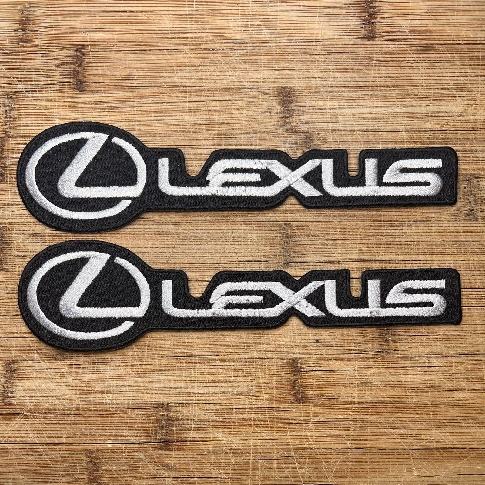 Lexus Logo Embroidered Patch Set of 2 – Black and Silver Car Emblems 8x2 Inches Lexus Logo Embroidered Patch Set of 2 – Black and Silver Car Emblems 8x2 Inches