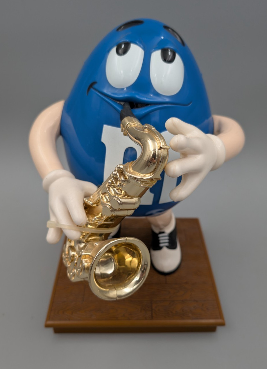 M & M\'S COLLECTIBLE - M & M Blue Peanut Playing The Saxophone/Candy Dispenser