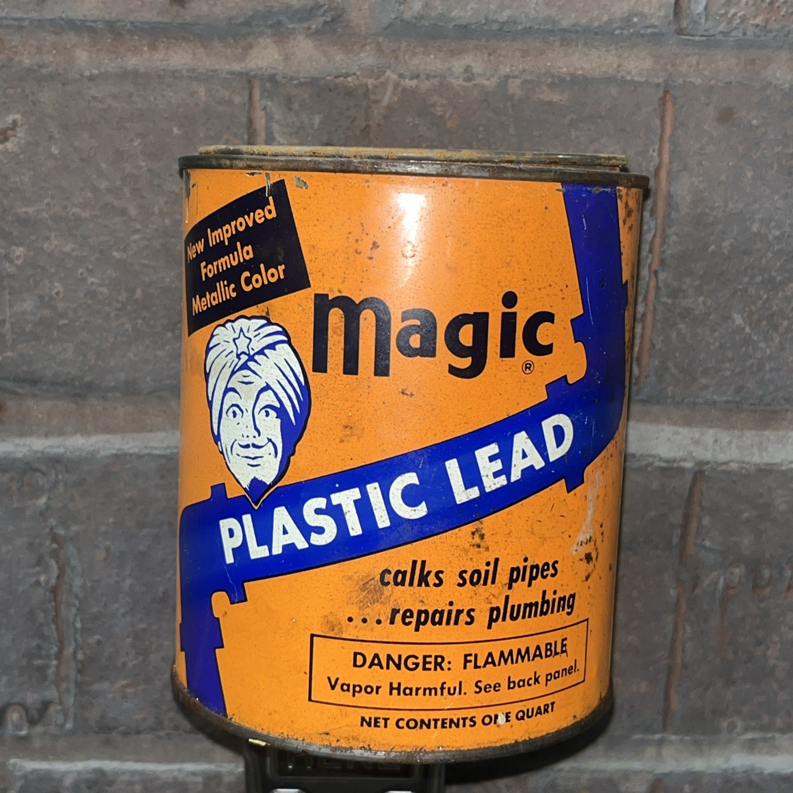 Rare Vintage Magic Plastic Lead Caulk Tin Can, Great Graphics Genie
