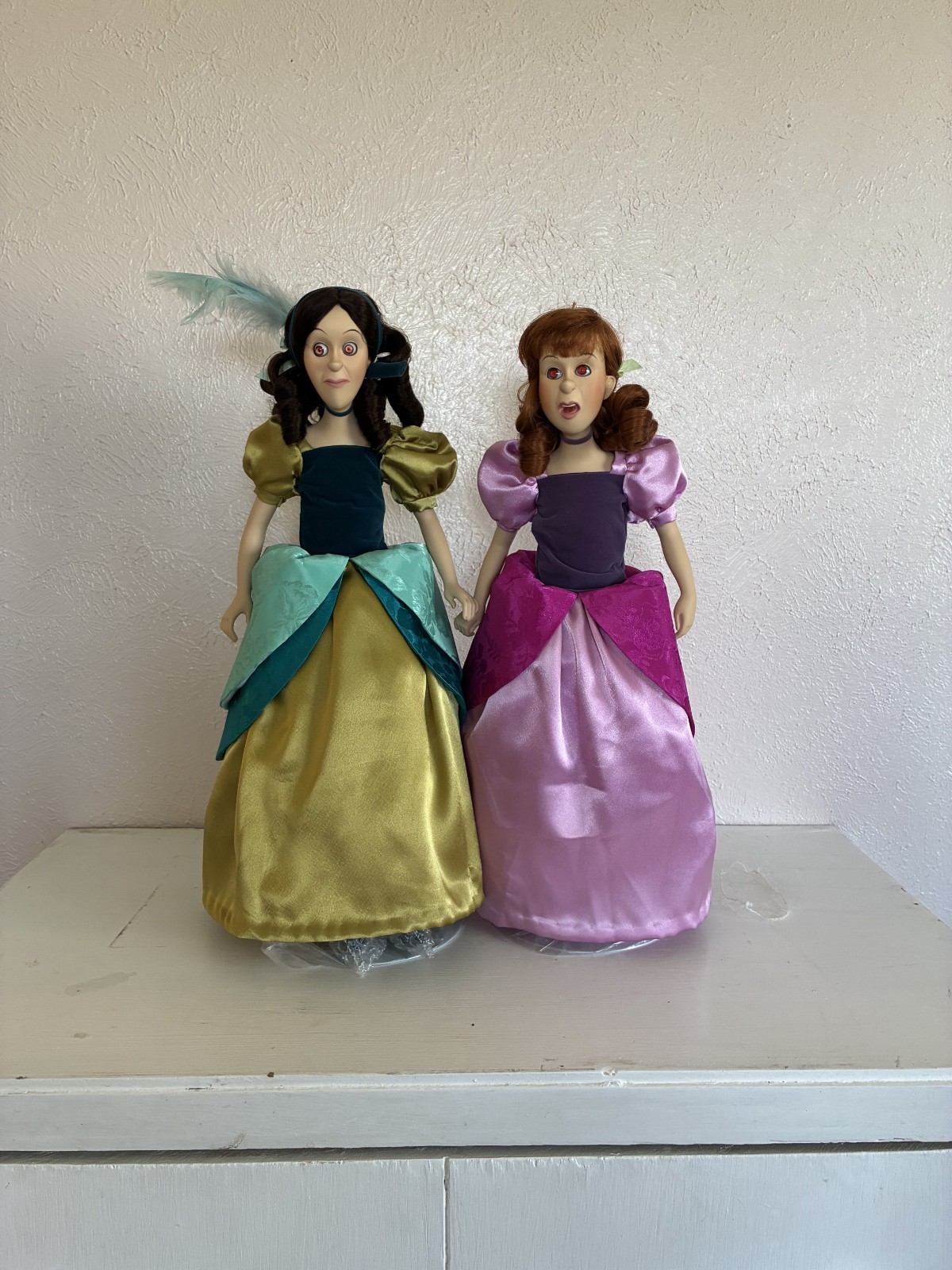 DISNEY WICKED STEP SISTER PORCELAIN DOLLS